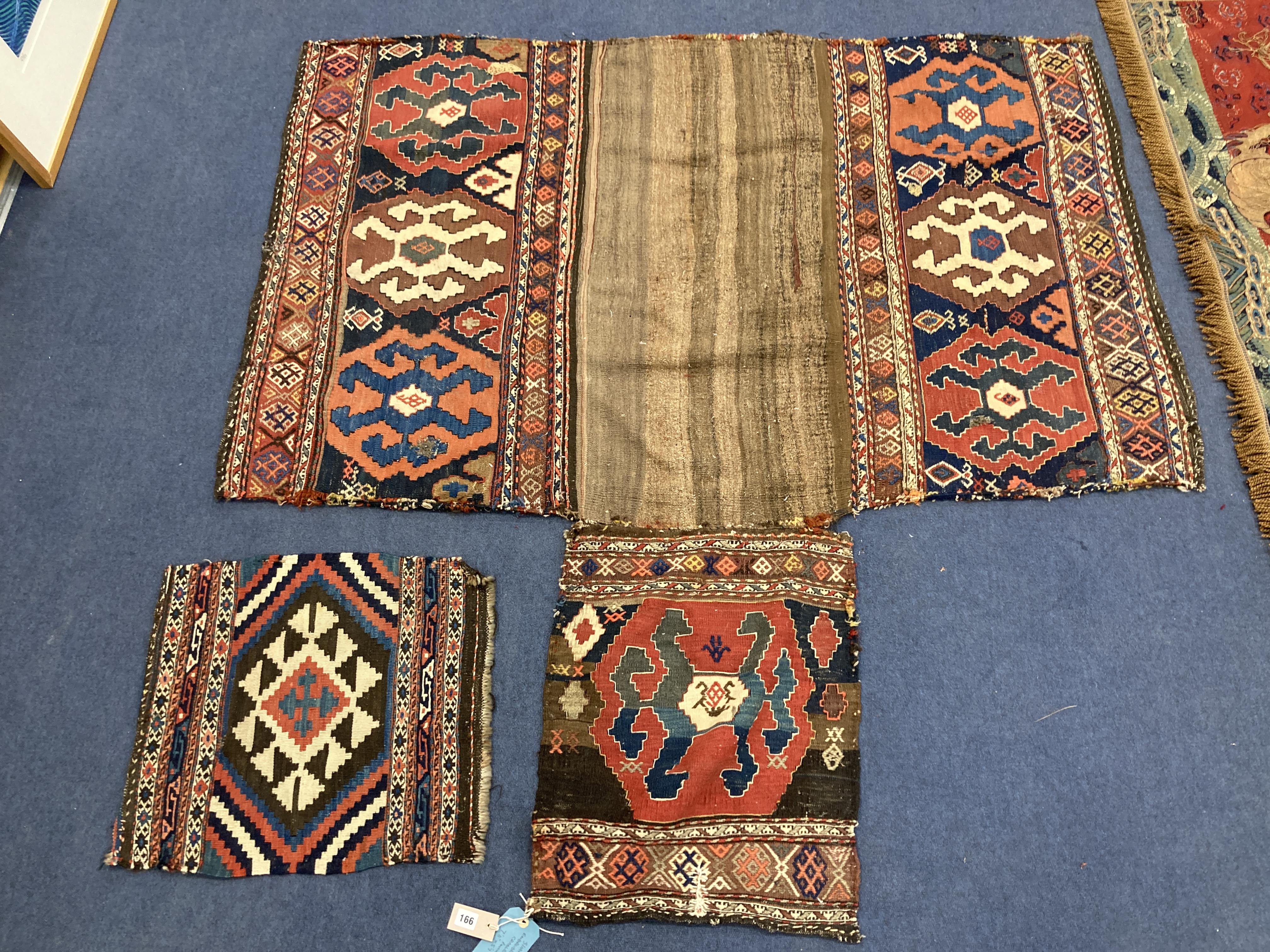 A Shah Savan embroidered Kelim cradle, 176 x 170cm and a small bag face rug, 49 x 54cm